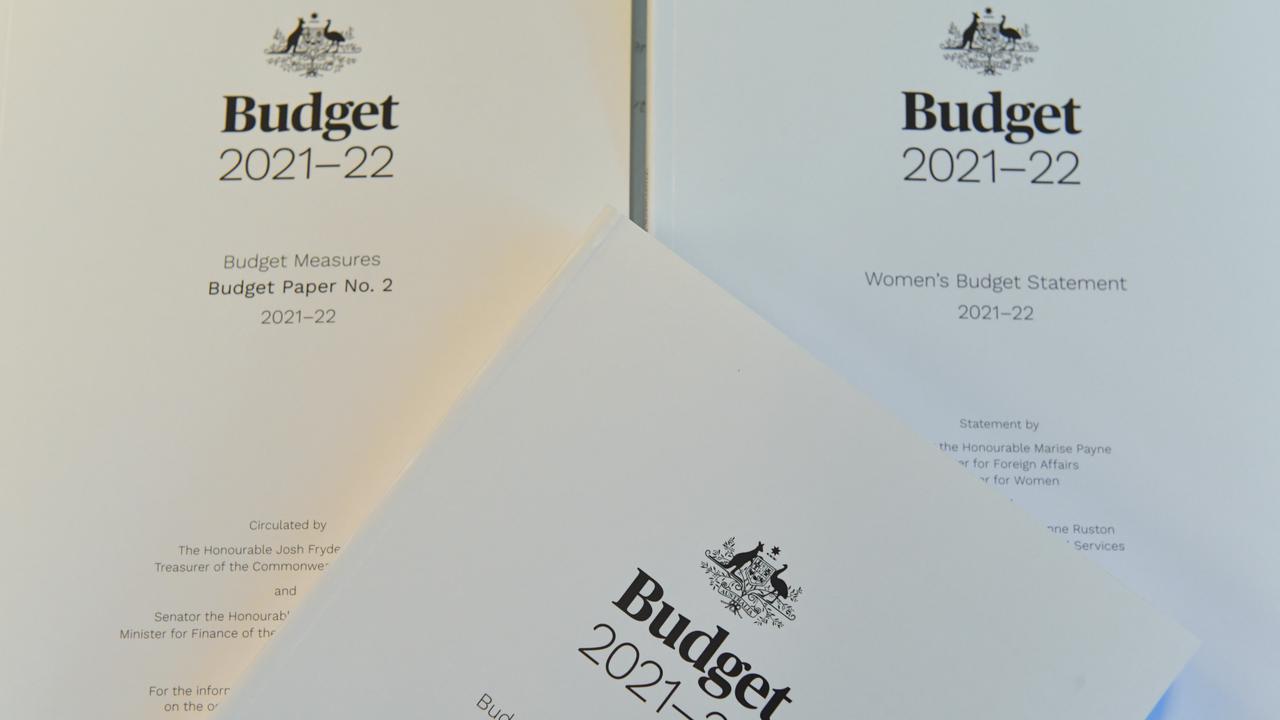 Australia's triple-A status with credit rating agencies remains despite a big-spending budget.
