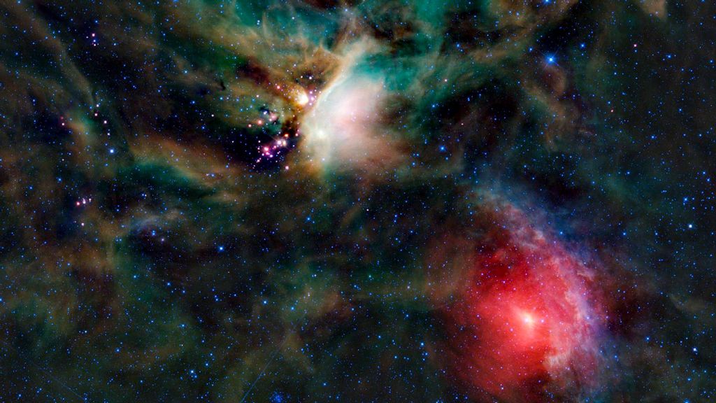 A rich collection of colorful astronomical objects is revealed in this picturesque image of the Rho Ophiuchi cloud complex from NASA's Wide-field Infrared Explorer, or WISE. (NASA)