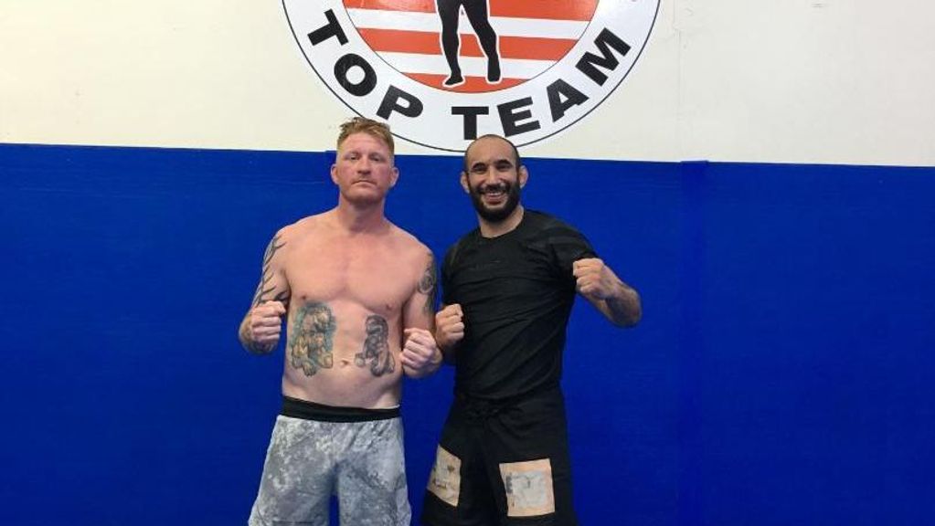 Ed Herman, left, with one of his training partners at his home gym. Herman features in a preliminary bout of UFC 265 Saturday night on pay-per-view. (Courtesy of Ed Herman)