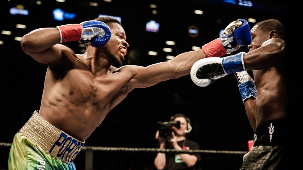 Shawn Porter (left) bounced back from a loss with a three-knockdown, ninth-round TKO of Andre Berto in a battle of two-time welterweight champions in 2017. (Amanda Westcott/SHOWTIME)