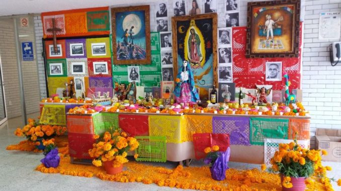 Skulls and marigold (cempasúchil) flowers showcase the Mexica traditions, while the images of virgins and saints highlight the Spanish influence on Day of the Dead. (Héctor Darío Aguirre Arvizu/Zenger)