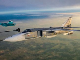 The Russian jet in the foreground has a fuel line attached for a midair refill over the country's the South Urals. (Ministry of Defense of the Russian Federation/Zenger)