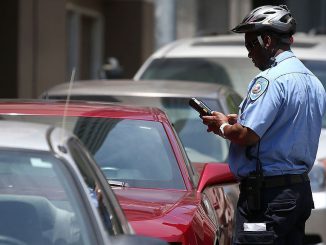 Parking tickets are a headache for those who park in city spaces. One startup aims to help reduce parking tickets for drivers. (Justin Sullivan/Getty Images)