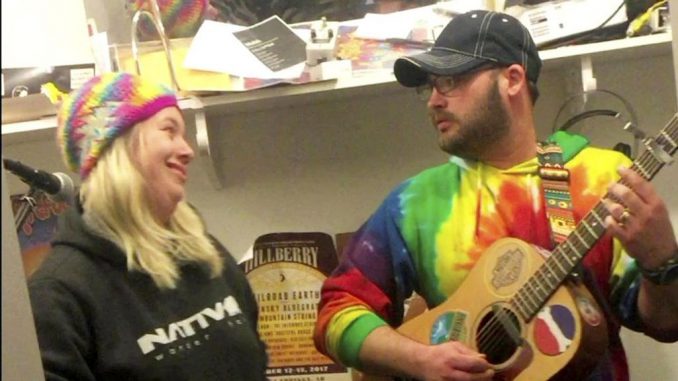 This is the adorable moment a wife joined her husband’s jam session and took over the microphone to reveal she was PREGNANT. (SWNS) 