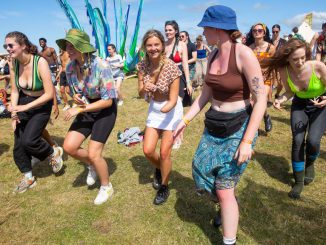 Festival-goers dancing at the hip-hop yoga class during Boardmasters Festival 2021 at Watergate Bay on August 14, 2021 in Newquay, England. (Photo by Jonny Weeks/Getty Images)