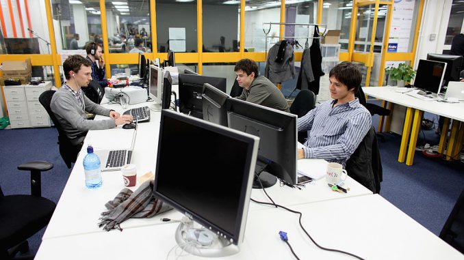 People work at computers in TechHub, an office space for technology start-up entrepreneurs, near the Old Street roundabout in Shoreditch which has been dubbed 'Silicon Roundabout' due to the number of technology companies operating from the area on March 15, 2011 in London, England.(Photo by Oli Scarff/Getty Images)