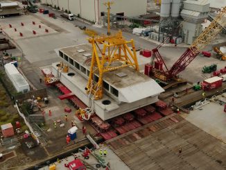 A floating crane has arrived at Hinkley Point C nuclear power station to lower its new water-cooling system into place on the seabed. (Dean Murray, SWSN/Zenger)