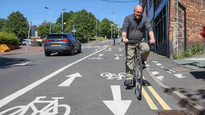 A resident has hit out at a council for closing a road for a month and building a 20ft cycle lane - which he says is just glorified lay-by. (Anita Maric, SWNS/Zenger)