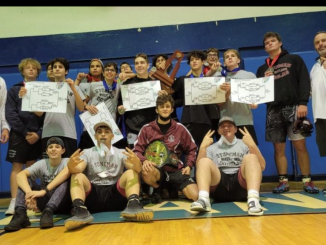 In February, head coach Kenny Gendason (right) and assistant Daniel Sanchez (left) led the Marjory Stoneman Douglas wrestling team to their first district championship since 2011. Sanchez formerly assisted Chris Hixon, who was among 17 people killed by Nicholas Cruz, 19, using an AK-47 on Valentine’s Day in 2018. (Kenny Gendason)