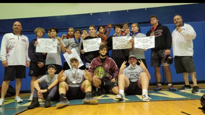 In February, head coach Kenny Gendason (right) and assistant Daniel Sanchez (left) led the Marjory Stoneman Douglas wrestling team to their first district championship since 2011. Sanchez formerly assisted Chris Hixon, who was among 17 people killed by Nicholas Cruz, 19, using an AK-47 on Valentine’s Day in 2018. (Kenny Gendason)