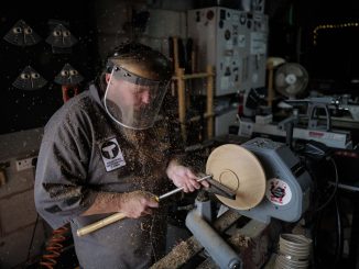 Chris Fisher, of Ashbourne, Derbyshire, Britain's first completely blind wood turner, July 27 2022. Fisher carves intricate items and works of art out of lumps of wood despite being blind - using his senses of touch and smell. (SWNS/Zenger)