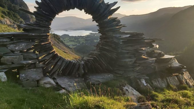 Pictures show an amazing piece of artwork made out of slate, created by a mystery artist who has now been dubbed the 'Borrowdale Banksy'. Daniel Farrington, 30, and wife Agnieszka, 34, came across the slate ring in Borrowdale, Cumbria,. around sunrise on Monday, August 1, 2022. (Daniel Farrington,SWNS/Zenger)