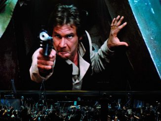 Actor Harrison Ford's Han Solo character from Star Wars Episode VI: Return of the Jedi is shown on screen while musicians perform during Star Wars: In Concert at the Orleans Arena on May 29, 2010 in Las Vegas. (Photo by Ethan Miller/Getty Images)