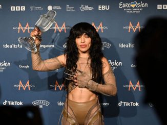 Singer Loreen performing on behalf of Sweden poses with the trophy after winning the final of the Eurovision Song contest 2023 on May 14, 2023 at the M&S Bank Arena in Liverpool, northern England. OLI SCARFF/JNS