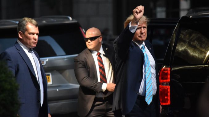 NEW YORK, UNITED STATES - MAY 31: Former President of the United States Donald J. Trump throws his fist in the air outside Trump Tower prior to his departure to a two-day trip to Des Moines, Iowa, in Manhattan, New York, United States on May 31, 2023. (Photo by Kyle Mazza/Anadolu Agency via Getty Images)
