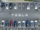 In an aerial view, Tesla cars sit parked in a lot at the Tesla factory on April 20, 2022 in Fremont, California. Tesla reported first quarter earnings that far exceeded analyst expectations with revenue of $18.76 billion compared to expectations of $17.80 billion. PHOTO BY JUSTIN SULLIVAN/GETTY IMAGES