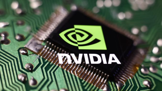 Microchip and Nvidia logo displayed on a phone screen are seen in this multiple exposure illustration photo taken in Krakow, Poland on April 10, 2023. (Jakub Porzycki/NurPhoto via Getty Images)