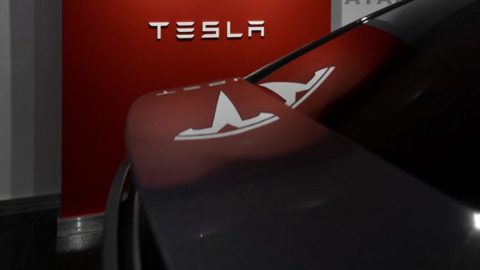 Photo of the Tesla logo behind a car. Third party wrap configurator Wrapmate rolls out wrap choices in various colors and textures for Tesla Cybertruck. MILAN CSIZMADIA/UNSPLASH.