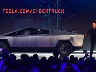 Tesla co-founder and CEO Elon Musk on stage with the newly unveiled all-electric battery-powered Tesla Cybertruck with broken glass on windows following a demonstation that did not quite go as planned on November 21, 2019 at Tesla Design Center in Hawthorne, California. - Tesla introduced a new electric sports utility vehicle slightly bigger and more expensive than its Model 3, pitched as an electric car for the masses. PHOTO BY FREDERIC J.BROWN/GETTY IMAGES