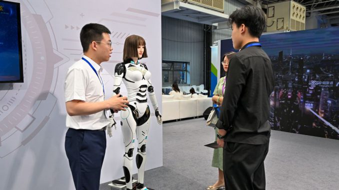 strongAn exhibitor introduces various functions of a front desk service robot to customers at the 2023 Kunshan Yuan Universe International Equipment Exhibition in Suzhou, Jiangsu province, China, June 27, 2023. Designed to handle unscripted communication tasks autonomously and proactively, Angel and Naomi use human-like thought processes to lead conversations instead of merely answering questions. And they get smarter with time and experience. CFOTO/FUTURE PUBLISHING/GETTY IMAGES/strong