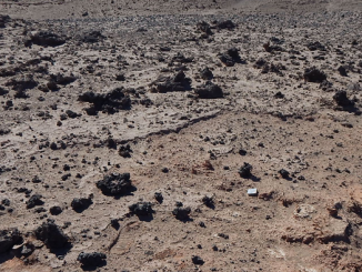 Deposits of dark silicate glass in Chile's Atacama Desert are found along a 47-mile corridor. A new study shows that those glasses were probably formed by the heat and shock caused by the explosion of a comet some 12,000 years ago. (P.H. Schultz/Brown University)