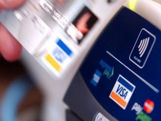 Communities of color tend not to use credit cards as much as white communities, making it more difficult to recover their money. (Thomas Cooper/Getty Images)