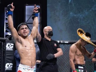 Enrique “Baby Bull” Gonzalez of Laredo, Texas, defeats Cristian “Puas” Perez of Mexico by unanimous decision to capture the 8-man tournament staged by Combate Global in Miami.  (Scott Hirano/Combate Global)