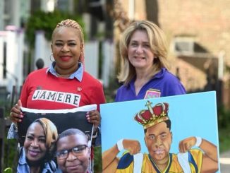 Ja' Mere Alfred's mother, LaRicha Rousell (left), and Crimestoppers Greater New Orleans president, Darlene Cusanza, holding images of Ja' Mere.  (Courtesy of LaRicha Rousell) 