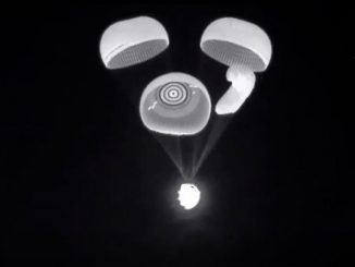 NASA’s SpaceX opens its parachutes as it descends to Earth on Nov. 8. The capsule carried four astronauts that set a record for the longest spaceflight by a U.S.-crewed spacecraft. (NASA/Zenger)