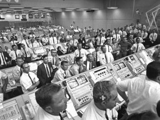 Engineers and scientists working at Kennedy Space Center are seen watching the lift-off of the Apollo 11 rocket vehicle on July 16, 1989. According to a recent study rocket scientists and brain surgeons aren't significantly smarter than the general population. (NASA)