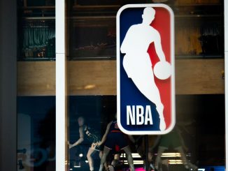 Under the NBA's updated health and safety protocols for COVID-19, players who are vaccinated and asymptomatic can return to action five days after a positive COVID-19 test as long as their cycle-threshold level is above 30. (Jeenah Moon/Getty Images)