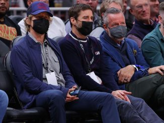 Actors and brothers Owen Wilson and Luke Wilson wear masks as they watch the Atlanta Hawks face the Houston Rockets at State Farm Arena on Dec. 13, 2021, in Atlanta, Georgia. (Kevin C. Cox/Getty Images)