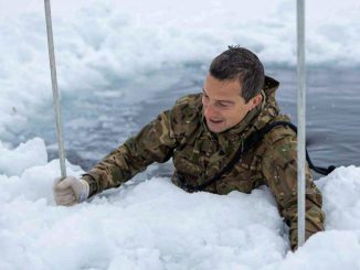 Bear Grylls completes an ice-breaking drill with the Royal Marines during Arctic exercises in Norway. (Royal Navy/Zenger)