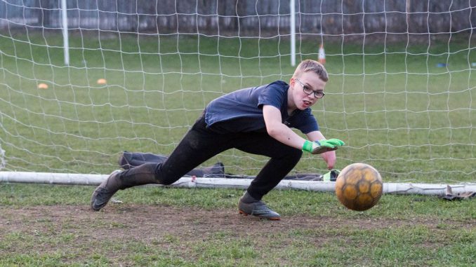 A football-mad youngster born with one arm is celebrating after his team helped him hit a fundraising target for a new bionic limb. (Lee Mclean/Zenger)