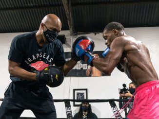 “Errol never went to formal therapy — boxing was therapy, and I was his therapist,” said trainer Derrick James (left) of Errol Spence (right), who was gravely injured in a car accident in October 2019. (Premier Boxing Champions)