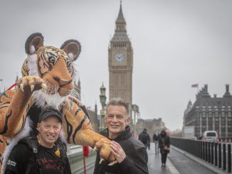 A wildlife photographer plans to run the Everest marathon this month – in a TIGER suit. (Paul Goldstein/Zenger)