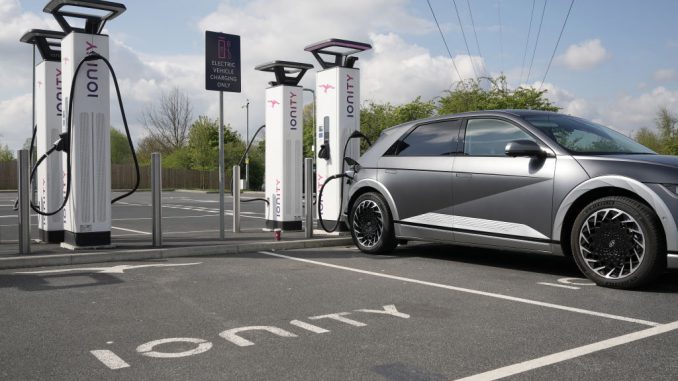 A Hyundai Ioniq battery electric vehicle (BEV) charges at an Ionity GmbH electric car charging station at Skelton Lake motorway service area on April 26, 2022 in Leeds, England. (Photo by Christopher Furlong/Getty Images)