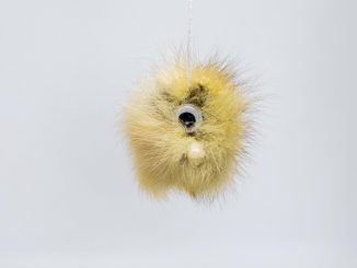 A taxidermist has created the world's first 'furry mice' for cars - stuffed animals which hang from rear view mirrors. (James Dadzitis SWNS/Zenger)