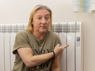 Sam Newland, 50, shows that each radiator in the house is set to 30 degrees on February 25, 2022. Newland is allergic to both cold and hot temperatures and has to have her heating on a constant 30 degrees in winter. (Leila Coker, SWNS/Zenger)