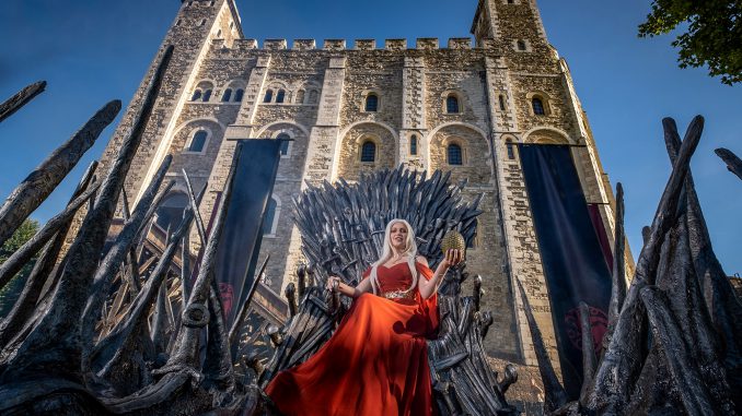 Cosplayer and superfan Sophia sits on the Iron Throne outside the Tower of London to mark the launch of the Game of Thrones prequel, House of the Dragon, in London, England, on Monday, August 8, 2022. (SWNS/Zenger)