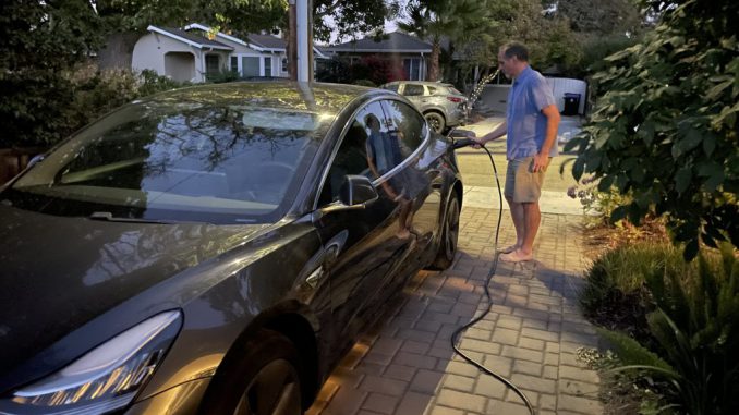 Charging of electric vehicles in the daytime would restrain extra costs for electricity systems, according to a new Stanford University study. (Amy Adams/Stanford University via SWNS)