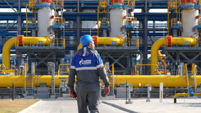 A Gazprom employee looks over a natural gas treatment facility at the Nord Stream 2 pipeline's entry point in northwest Russia. (Peter Kovalev/Getty Images)