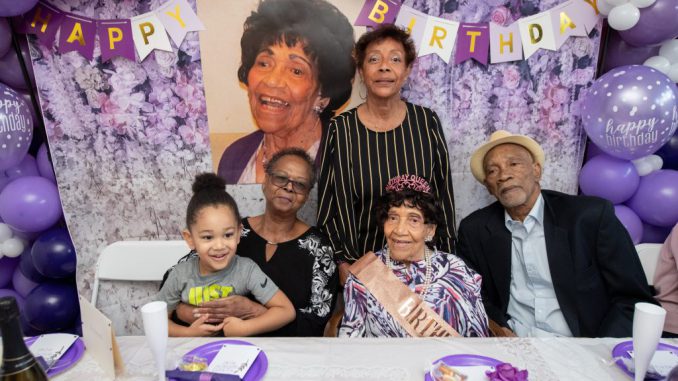 Merah Smith, who loved kickboxing and dancing, surrounded by family on her 110th birthday. She credits her longevity to a healthy diet and faith. TONY KERSHAW VIA SWNS 