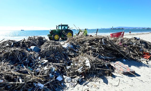 City crews have been busy compiling mounds of trash left along the shoreline following the recent storms in Long Beach, California, on Tuesday, Jan. 17, 2023. After weeks of winter storms that brought flooding rains to California, water hasn't been the only thing flowing into the ocean. BRITTANY MURRAY/ACCUWEATHER