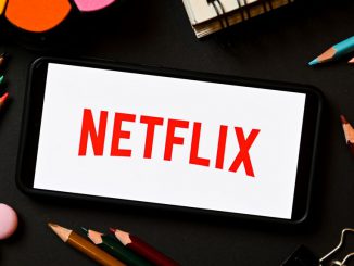 In this photo illustration a Netflix logo seen displayed on a smartphone. The streaming wars continue to heat up with many players battling for subscribers and revenue. SOPA IMAGES/BENZINGA