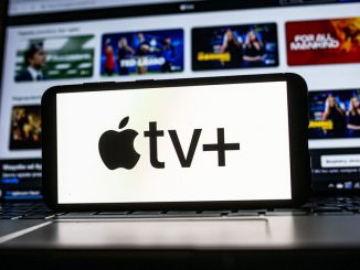 In this photo illustration an Apple TV+ logo seen displayed on a smartphone. Ted Lasso was the most watched show in March. MATEUSZ SLODKOWSKI/BENZINGA