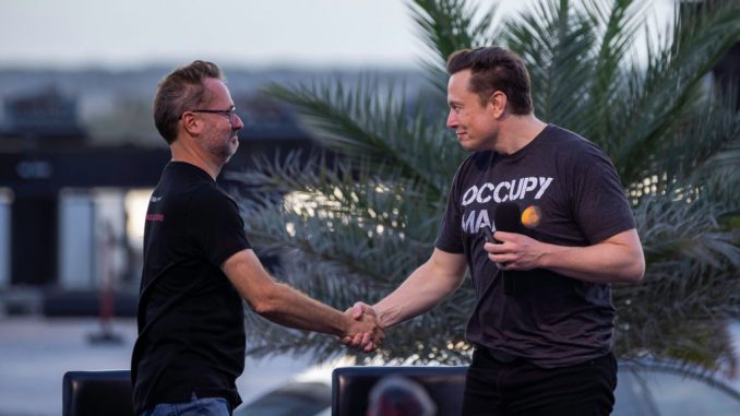 SpaceX founder Elon Musk and T-Mobile CEO Mike Sievert on stage during a T-Mobile and SpaceX joint event on August 25, 2022, in Boca Chica Beach, Texas. SpaceX and T-Mobile agreed to a partnership on satellite-to-cell services to end dead spots for cellular services. MICHAEL GONZALEZ/GETTY IMAGES