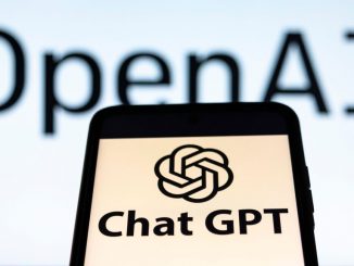 Photo illustration showing ChatGPT and OpenAI research laboratory logo and inscription at a mobile phone smartphone screen with a blurry background. Open AI is an app using artificial intelligence technology. Italy is the first European country to ban and block the robot Chat GPT application and website. ChatGPT is an artificial-intelligence (AI) chatbot developed by OpenAI and launched in November 2022 using reinforcement learning techniques both from machine and human feedback. Amsterdam, the Netherlands on April 1, 2023. NICOLAS ECONOMOU/BENZINGA