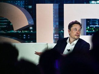 Twitter CEO Elon Musk speaks at the Twitter 2.0: From Conversations to Partnerships, marketing conference in Miami Beach, Florida, on April 18, 2023. Musk currently runs and owns four companies at once all. CHANDAN KHANNA/BENZINGA