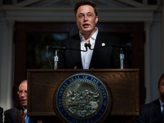 Elon Musk, CEO of Tesla Motors, speaks at a press conference at the Nevada State Capitol, September 4, 2014, in Carson City, Nevada. Musk and Sandoval announced a plan to build a Tesla Gigafactory in Nevada to produce batteries for electric vehicles providing 6,500 jobs to the state. MAX WHITTAKER/BENZINGA 
